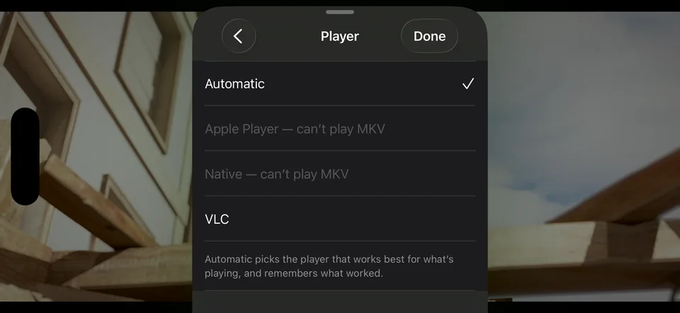 The Player menu on iPhone: Automatic, with Apple Player and Native unable to play MKV, and VLC
